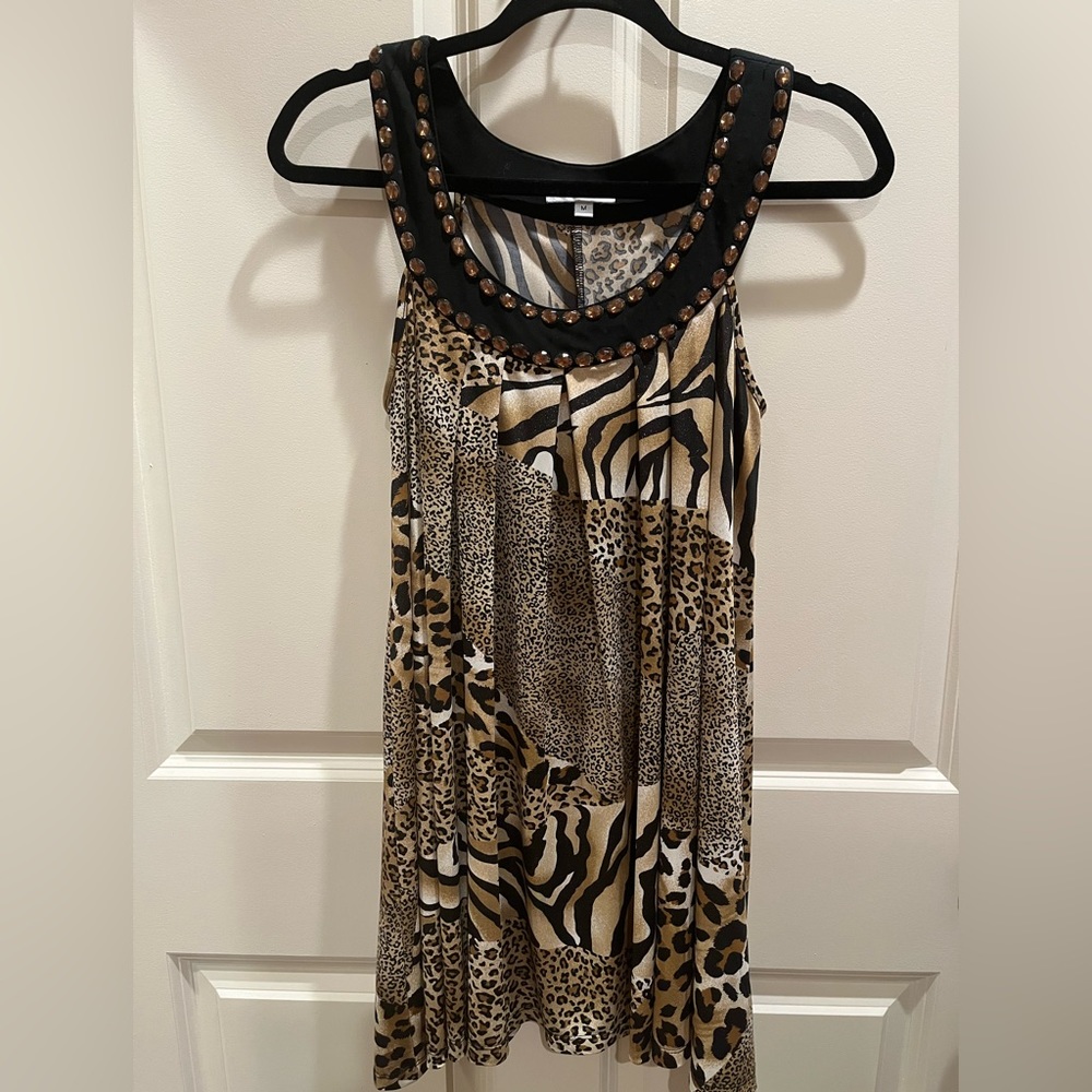 Como Design brand. Size Medium. Animal print